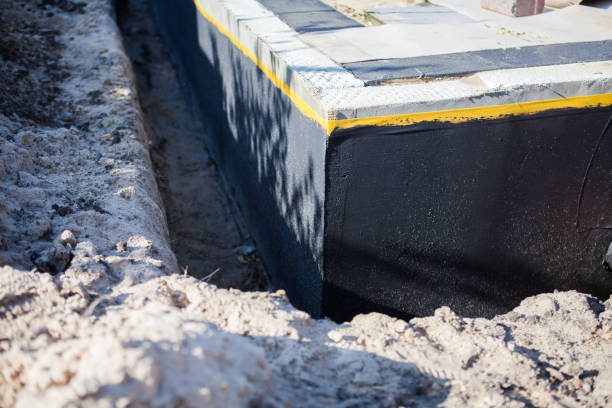 Professional Wet Basement Repair technician working in Atlas, MI